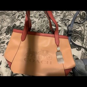 Brand new never worn Coach tote. Tags still on.